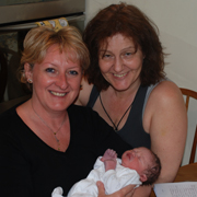 Michelle & Sue having a cuddle with Oliver