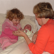 Aimee meeting her newbaby sister